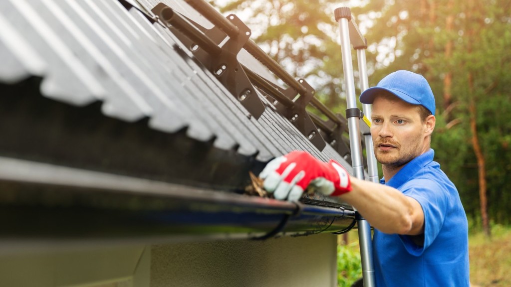 man installing guttering